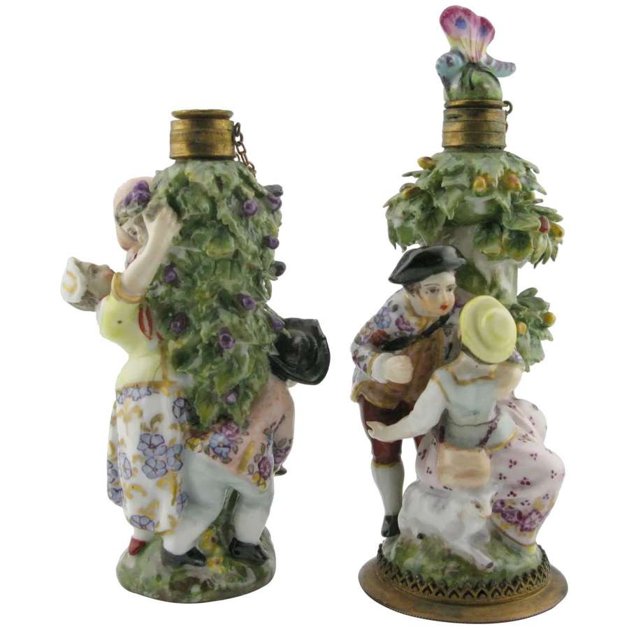 A pair of 19th-century Helena Wolfsohn Dresden figural scent bottles.